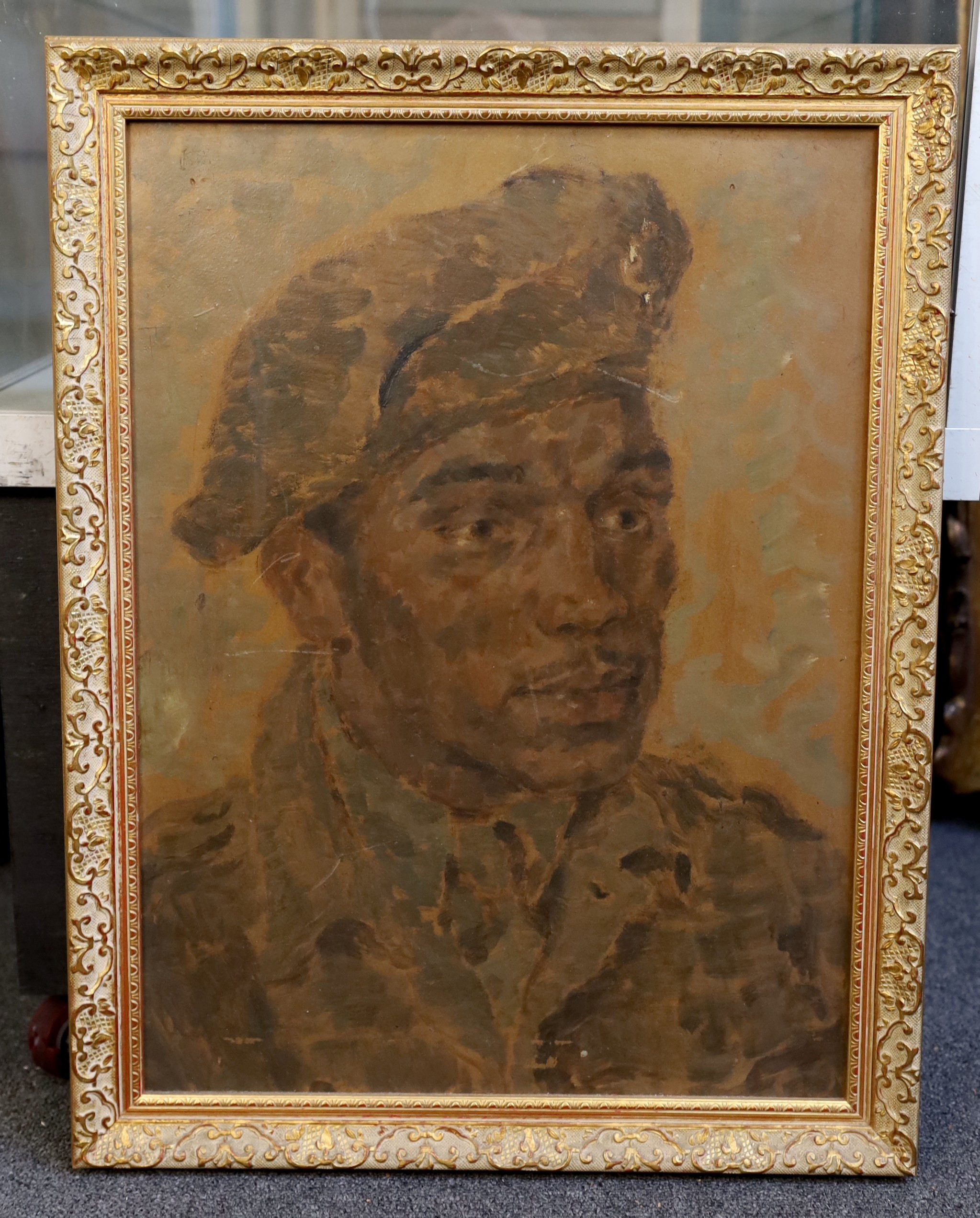 Oliver Messel (British, 1904-1978), Portrait of a black man in military uniform, oil on board, 53 x 39cm